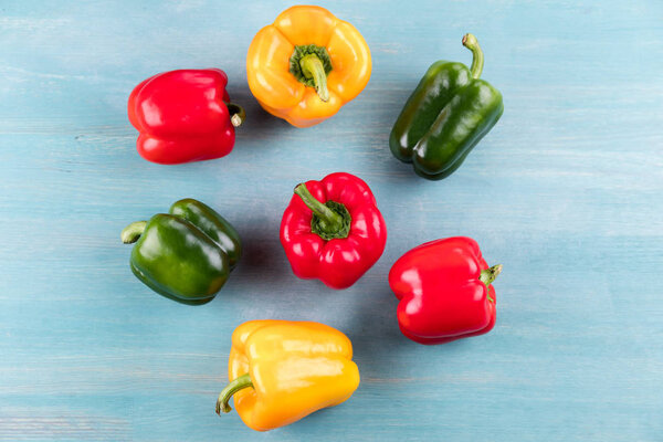 Peppers on wooden table 