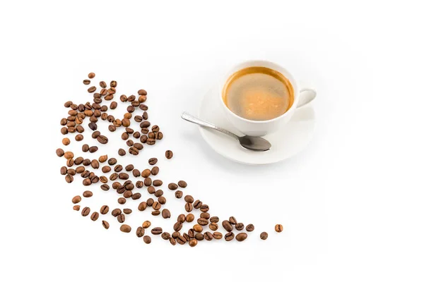 Koffiebonen en een kop koffie — Stockfoto