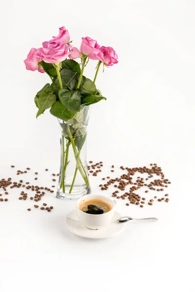 Cup of coffee and flowers — Stock Photo, Image