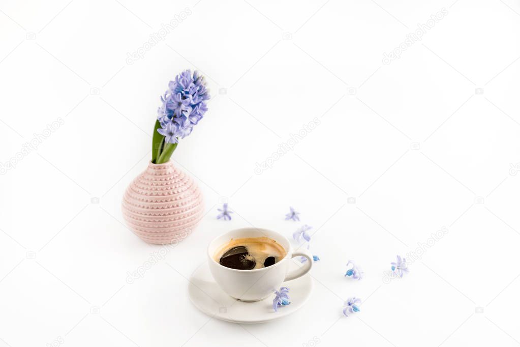 Cup of coffee and flowers 