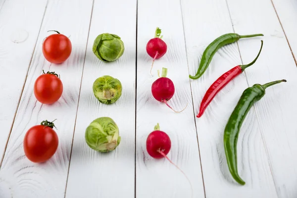 Seasonal vegetables in rows — Stock Photo