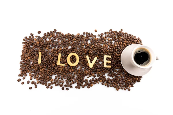 Cup of coffee and coffee beans — Stock Photo