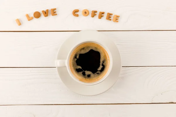 Tasse de café vapeur et lettrage — Photo de stock