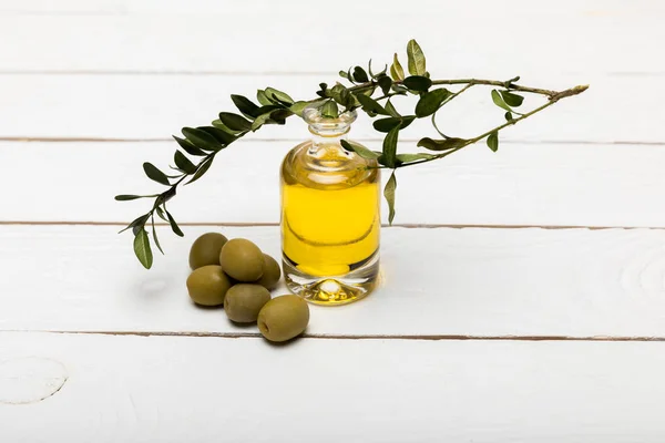 Olives and essential oil — Stock Photo