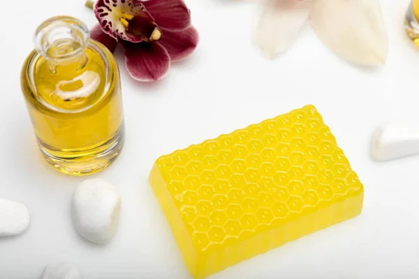 Honey soap with orchids and oil — Stock Photo