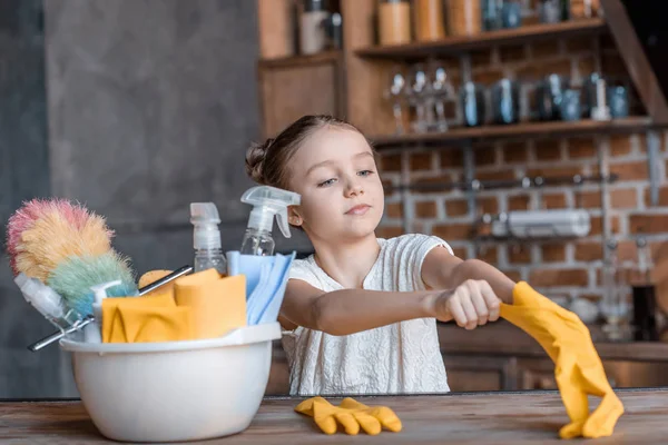 Girl with cleaning supplies — Stock Photo, Image