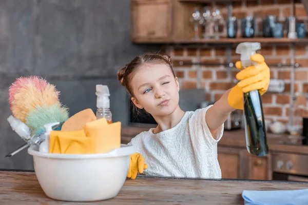 Girl with cleaning supplies — Stock Photo, Image