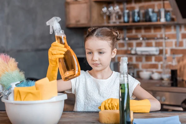 Girl with cleaning supplies — Stock Photo, Image