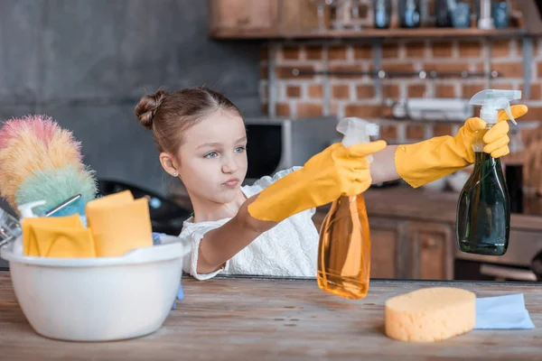 Girl with cleaning supplies — Stock Photo, Image