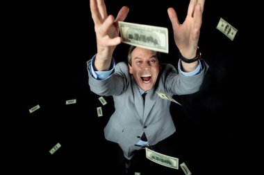 businessman catching dollars clipart