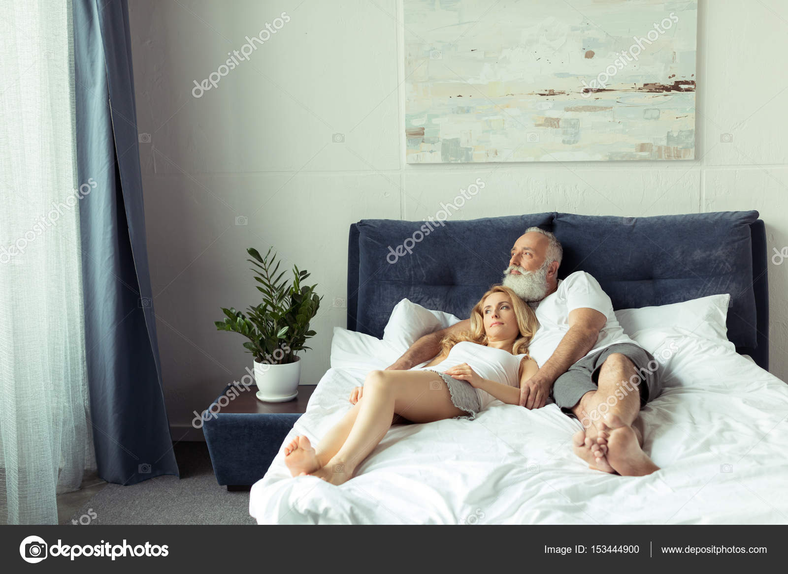 depositphotos_153444900-stock-photo-couple-relaxing-on-bed.jpg