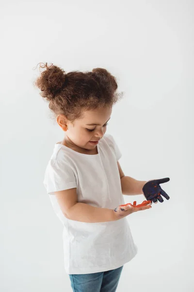 Little kid girl with painted hands — Stock Photo, Image