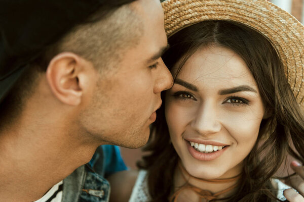 stylish couple hugging on the street