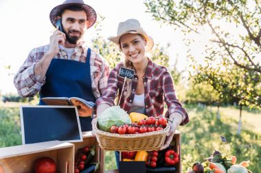 farmers selling veggies at market clipart