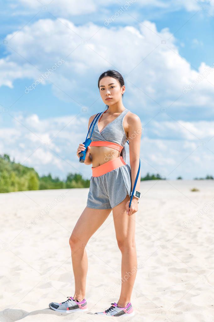 sportswoman with jump rope