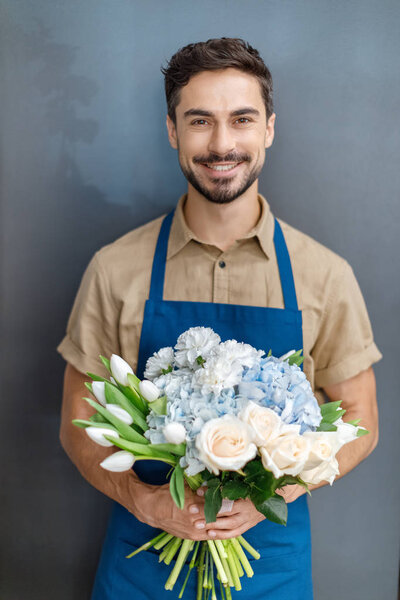 handsome florist with flowers