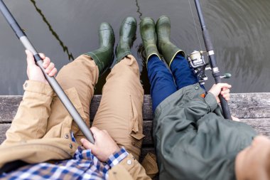 father and son fishing together clipart