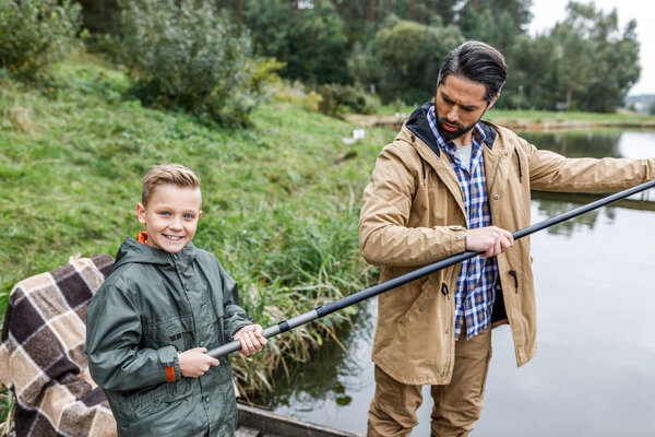 father and son fishing together