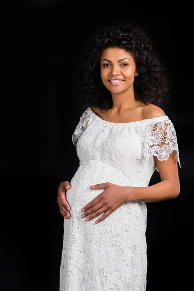 Femme enceinte touchant le ventre — Photo