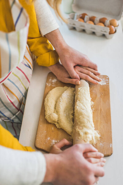 couple making dough