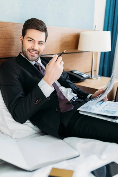 Happy Businessman Holding Newspaper Looking Camera — Stock Photo, Image