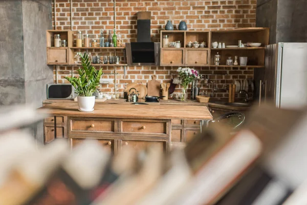 Interior of kitchen with brick wall in loft style, focus on background — Stock Photo