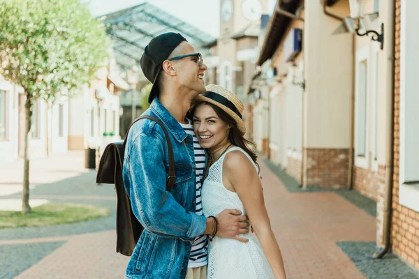 Young stylish couple hugging — Stock Photo