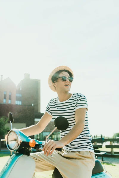 Man riding scooter — Stock Photo