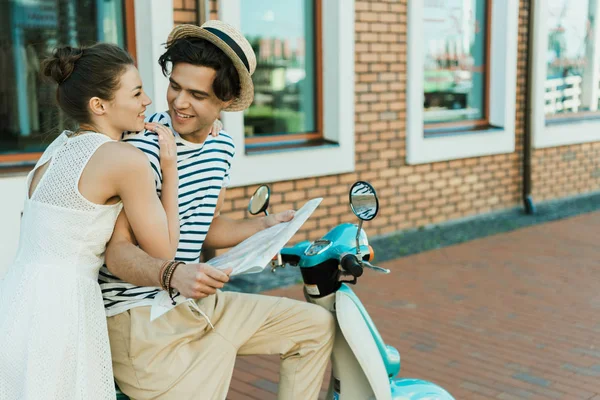 Couple in love with map — Stock Photo