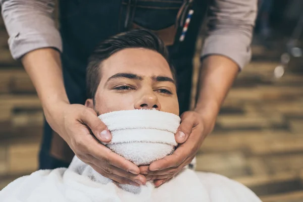 Client before shaving in barber shop — Stock Photo