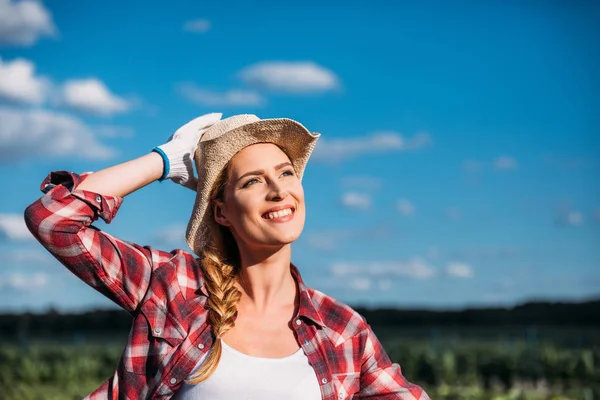 Smiling young female farmer — Stock Photo