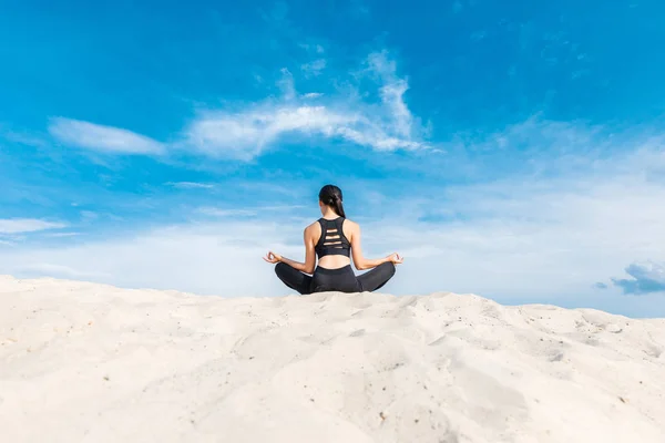 Yogi meditating in lotus pose — Stock Photo