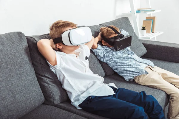 Boys in virtual reality headsets — Stock Photo