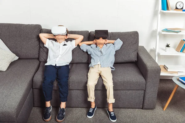 Boys in virtual reality headsets — Stock Photo