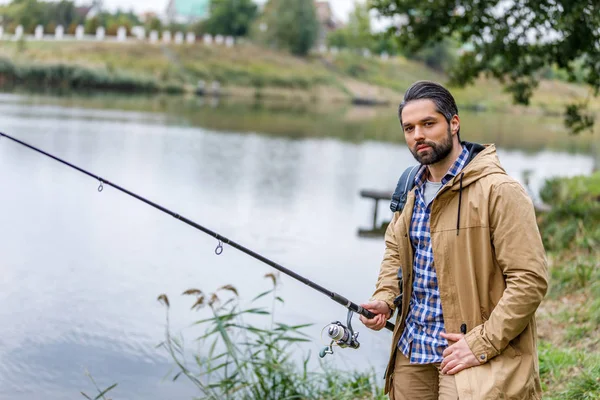 Man fishing with rod — Stock Photo