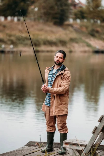 Man fishing with rod — Stock Photo