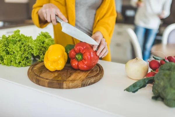 Cutting peppers — Stock Photo