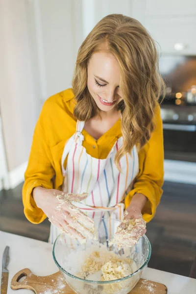Young female baker — Stock Photo