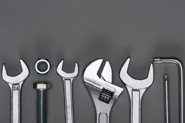 Top view of set of various work tools on grey — Stock Photo, Image