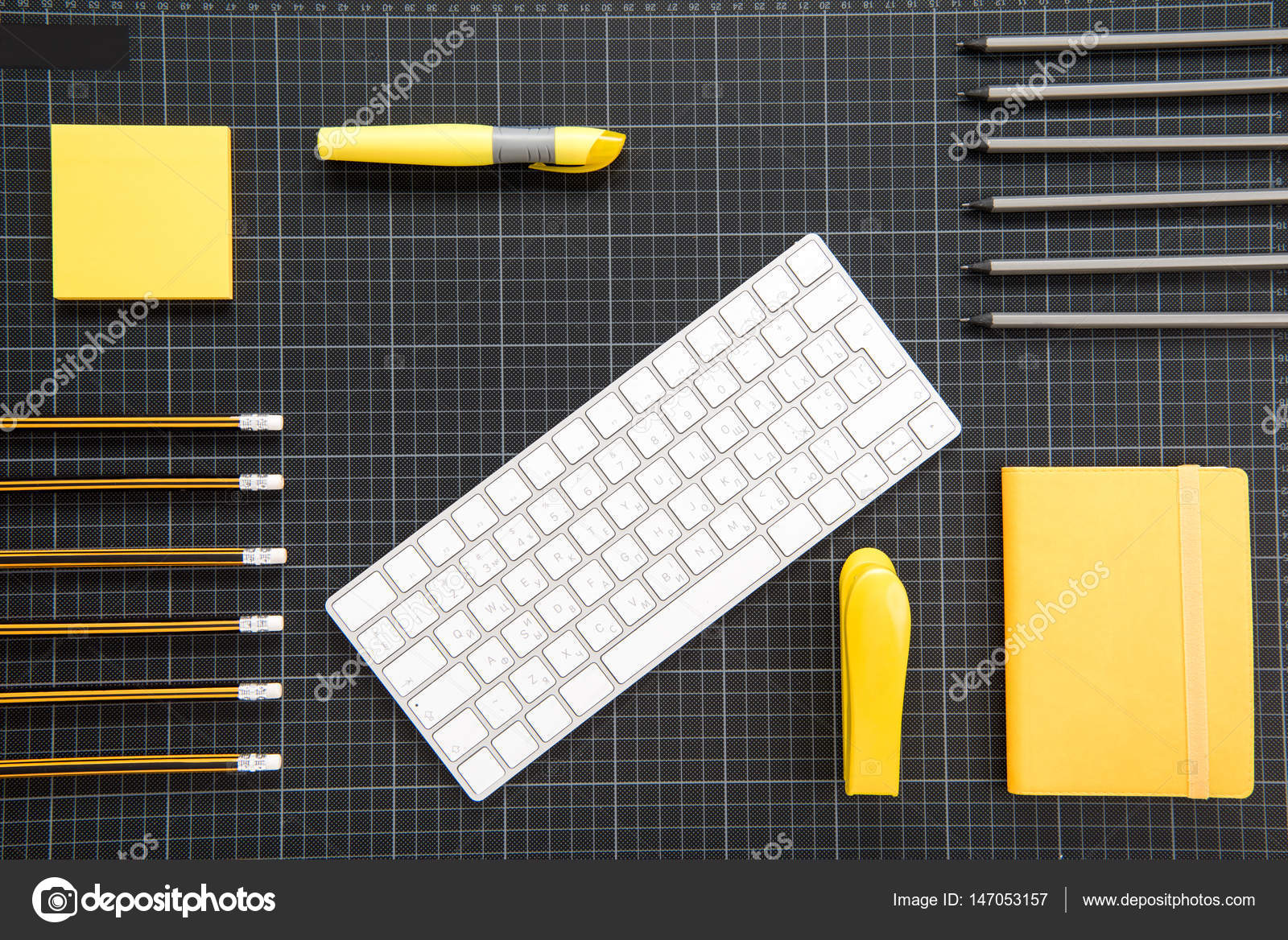 Keyboard and office supplies Stock Photo by ©DimaBaranow 147053157
