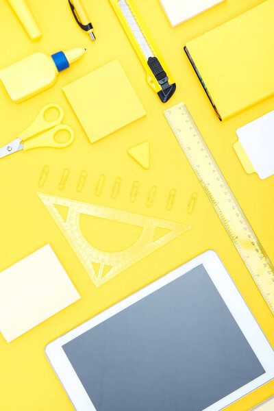 Digital tablet and office supplies 