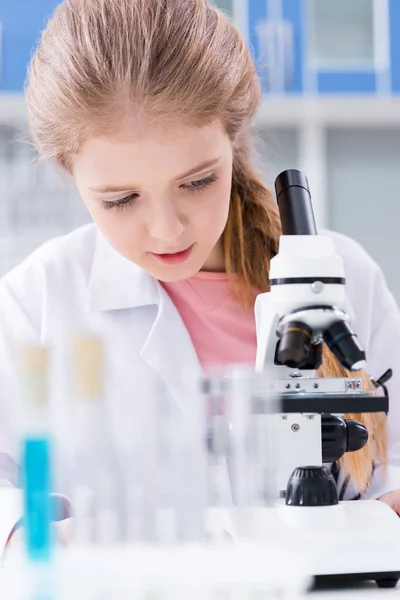 Little girl with microscope — Stock Photo, Image