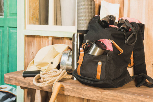  different trekking equipment on bench