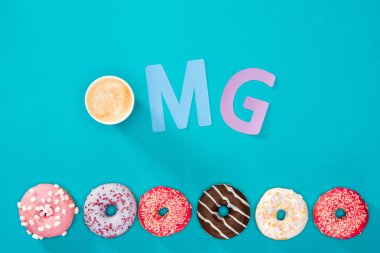 Several donuts with cup of coffee  clipart