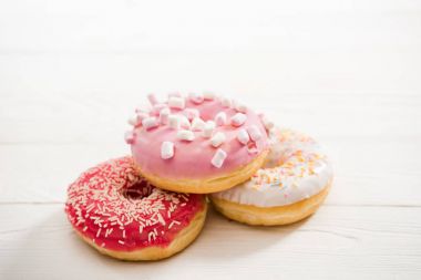 Tasty donuts with frosting clipart