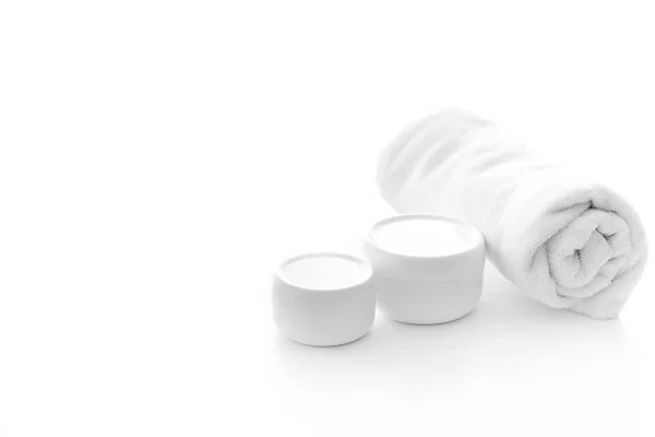 Skin creams and towel — Stock Image Skin creams and towel Stock Image