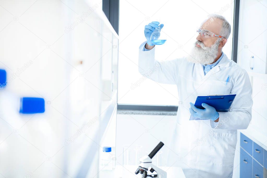 Scientist making experiment 