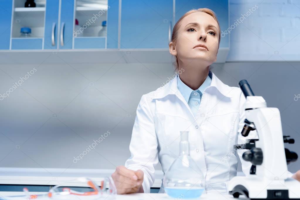 scientist sitting at workplace