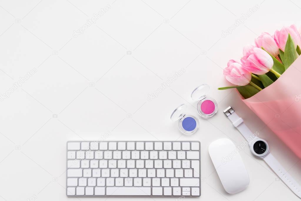 Pink tulips and keyboard 