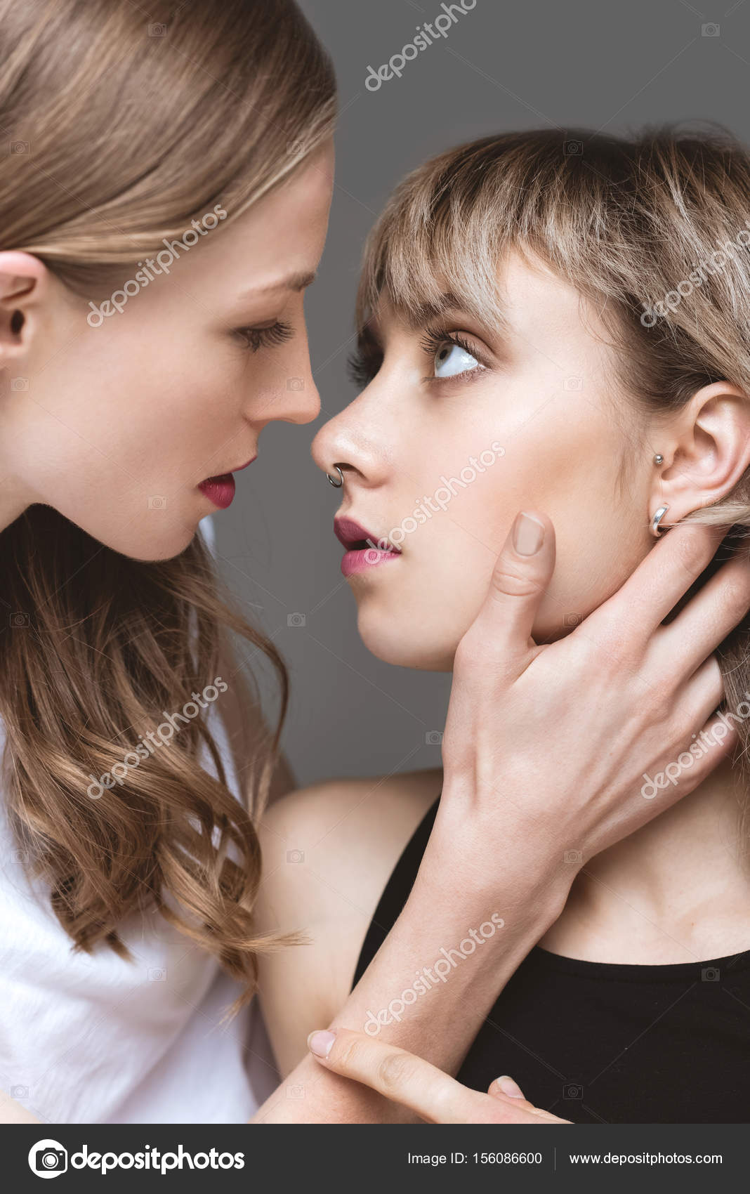 Young sensual lesbian couple Stock Photo by ©DimaBaranow 156086600
